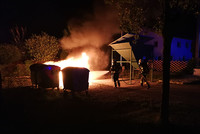 Feuerwehr bei den Löscharbeiten Feuerwehr bei den Löscharbeiten
