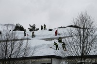Feuerwehrleute am Dach Feuerwehrleute am Dach