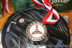 Asphaltstock mit Medaille Asphaltstock mit Medaille