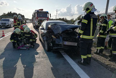 Einsatzkräfte an der Unfallstelle Einsatzkräfte an der Unfallstelle